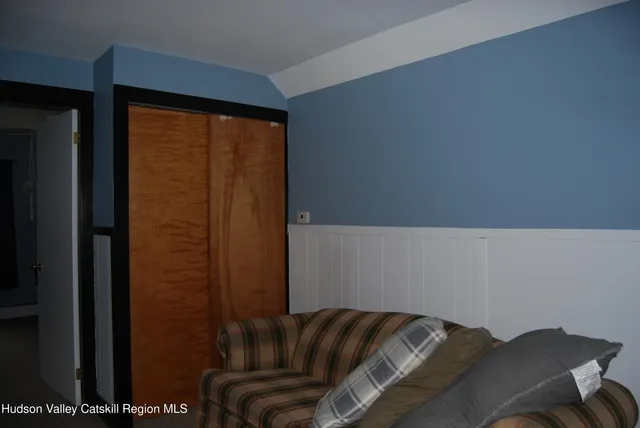 a view of hallway with livingroom