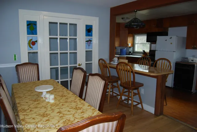 a view of a dining room with furniture
