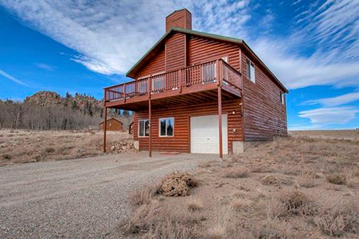 455 Apache Trail Jefferson, CO 80456 - Photo 2 of 34 a view of a house with a yard