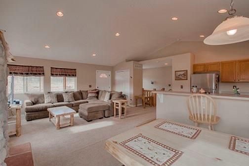 455 Apache Trail Jefferson, CO 80456 - Photo 14 of 34 a living room with furniture and a wooden floor
