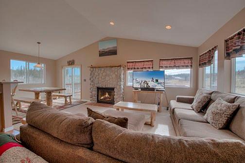 455 Apache Trail Jefferson, CO 80456 - Photo 6 of 34 a living room with furniture and a fireplace