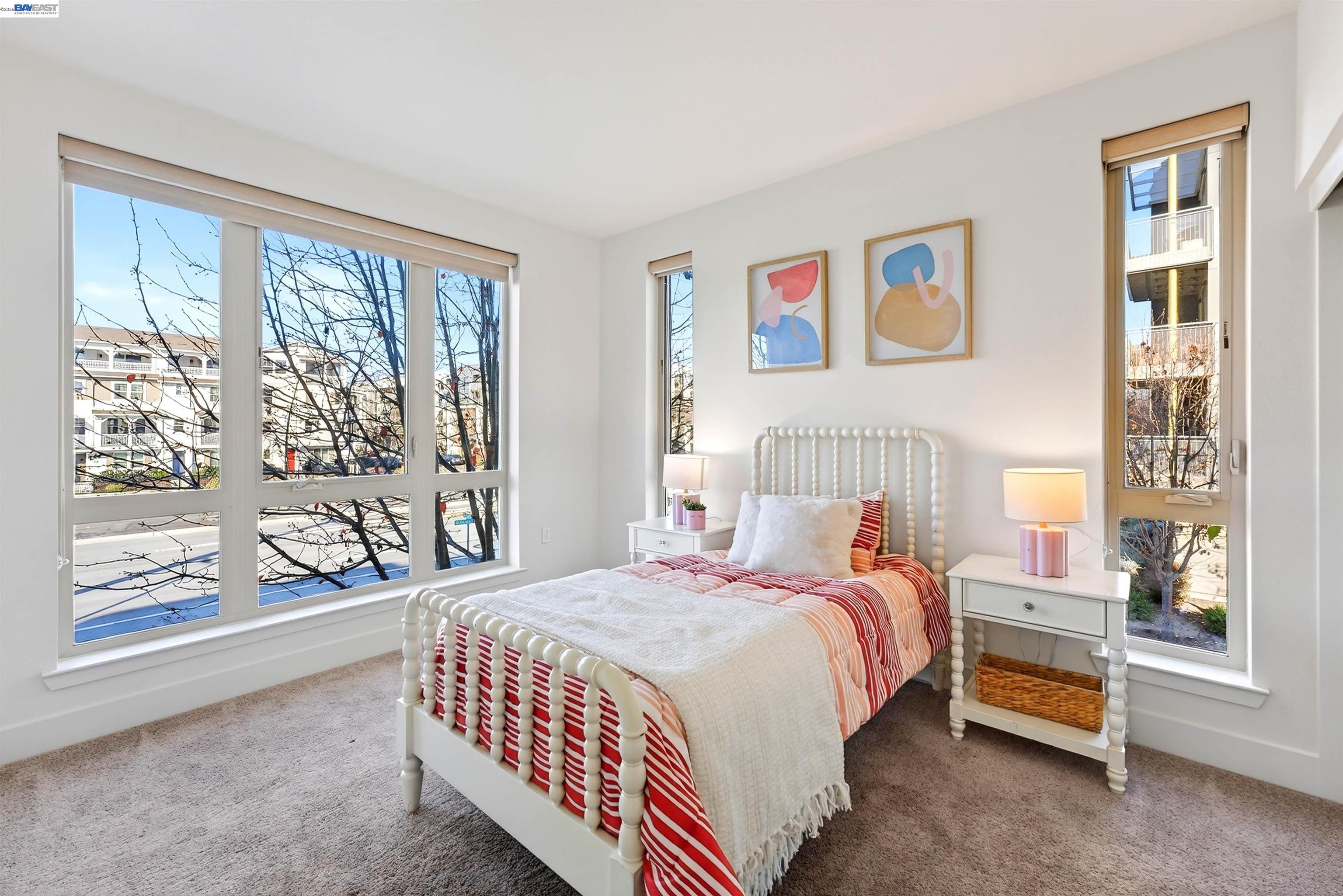 430 Montague Expressway, Unit 20 Milpitas, CA 95035 - Photo 12 of 50 a bedroom with a bed and a window