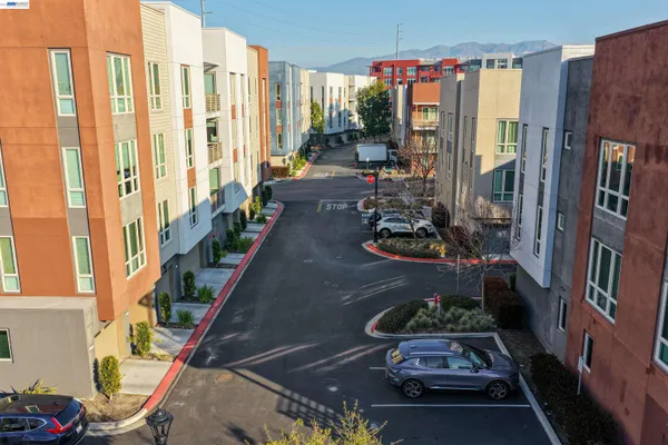 a view of a street with large building