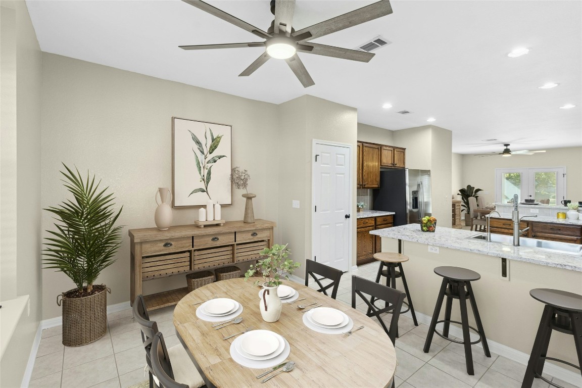110 Crosby Street Georgetown, TX 78633 - Photo 12 of 40 a kitchen with a table and chairs in it