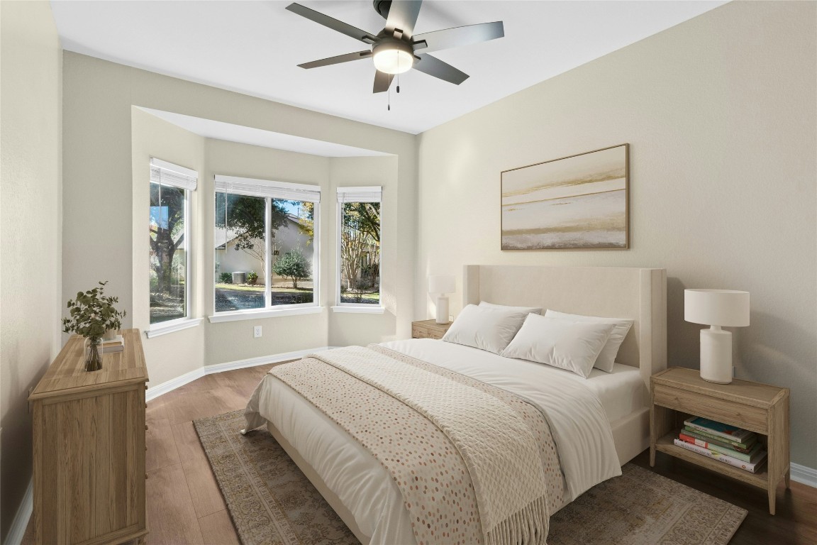 110 Crosby Street Georgetown, TX 78633 - Photo 19 of 40 a bedroom with a large bed and a window