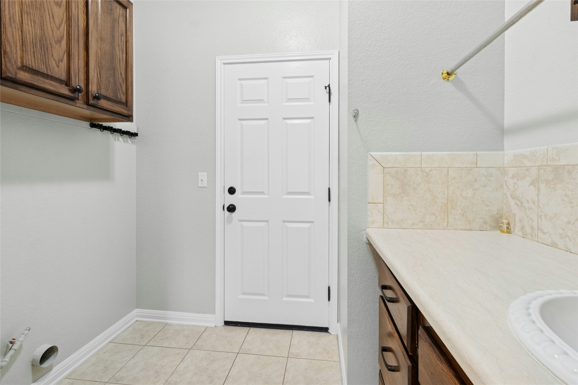 110 Crosby Street Georgetown, TX 78633 - Photo 24 of 40 a bathroom with a sink and a shower