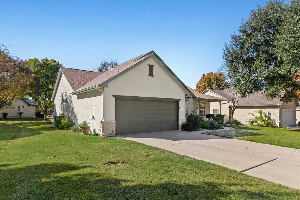 110 Crosby Street Georgetown, TX 78633 - Photo 30 of 40 a front view of house with yard and green space