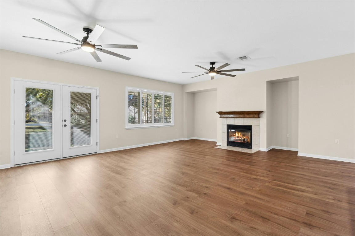 110 Crosby Street Georgetown, TX 78633 - Photo 3 of 40 an empty room with fan and windows