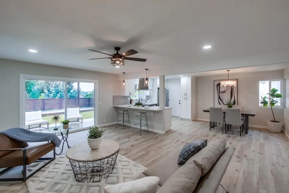 5886 Cowles Mountain Boulevard La Mesa, CA 91942 - Photo 5 of 39 a living room with furniture and a wooden floor
