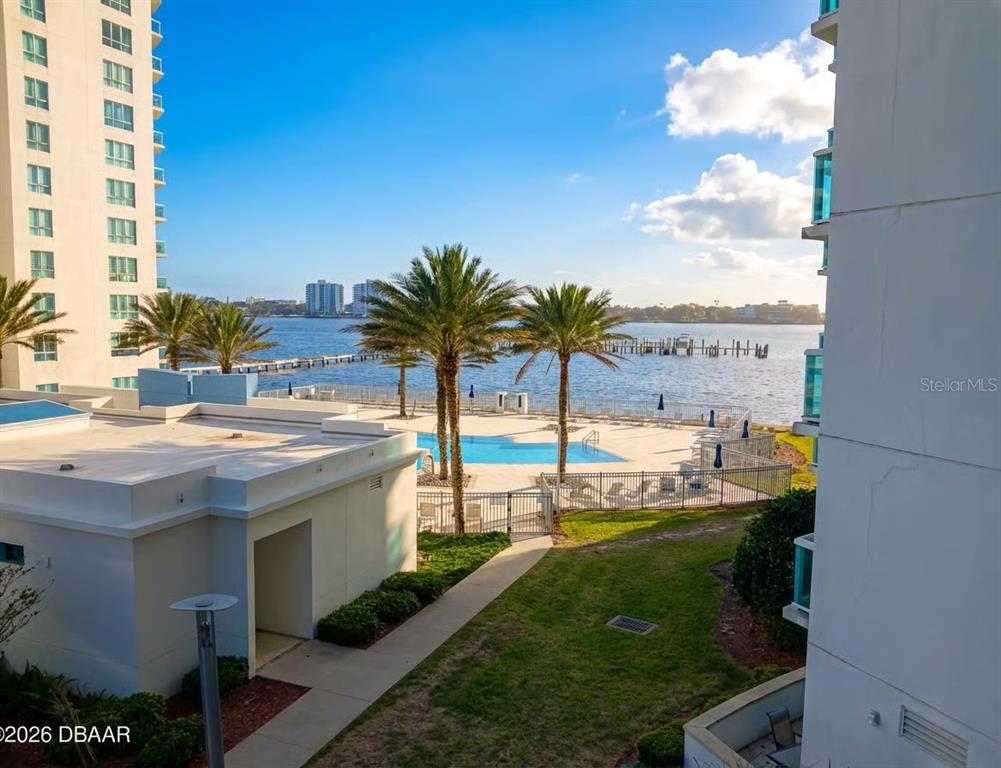 231 Riverside Drive, Unit 3081 Daytona Beach, FL 32117 - Photo 14 of 15 a view of a swimming pool and outdoor space