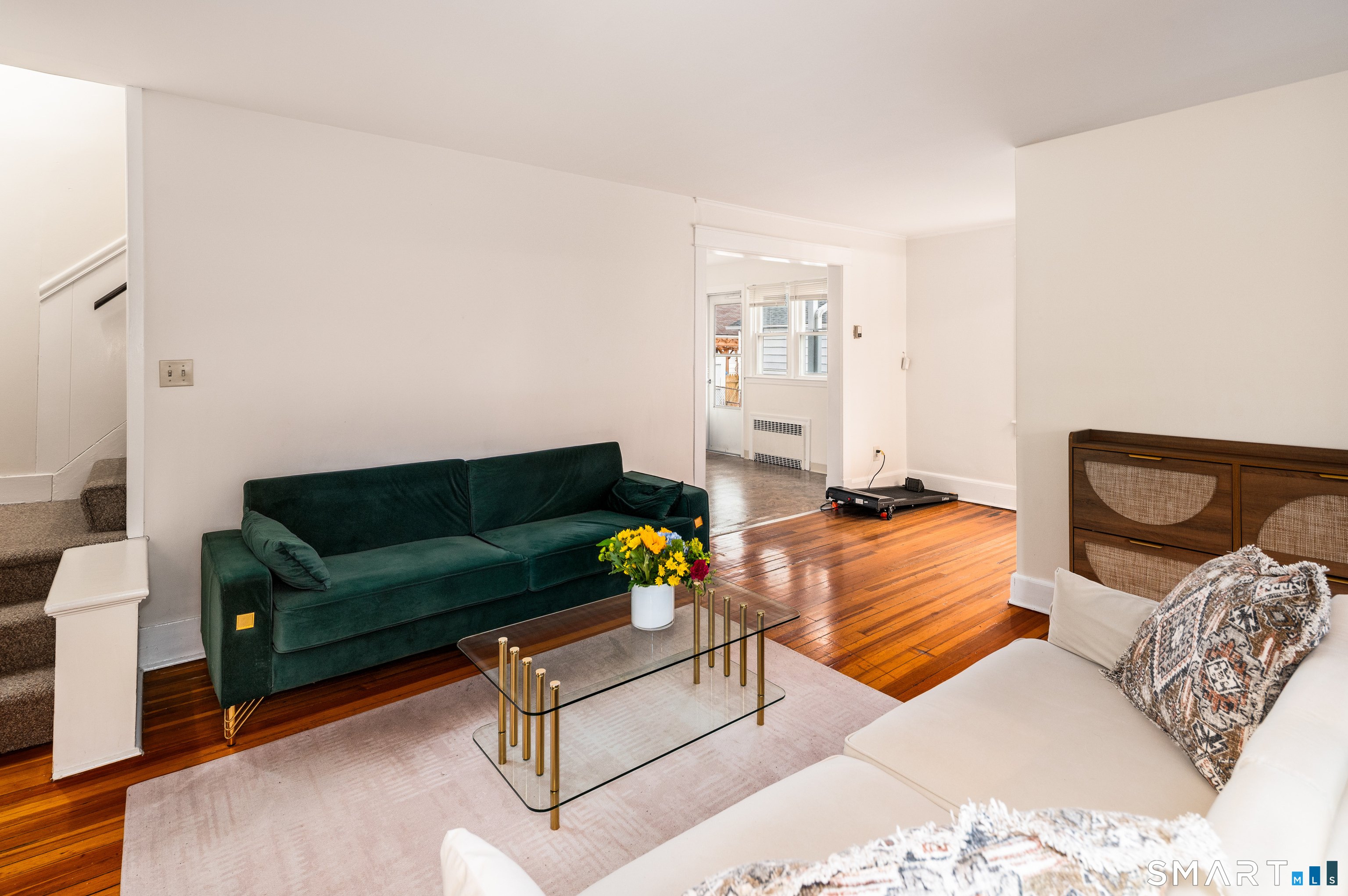 760 Hope Street Stamford, CT 06907 - Photo 11 of 38 a living room with furniture and a couch