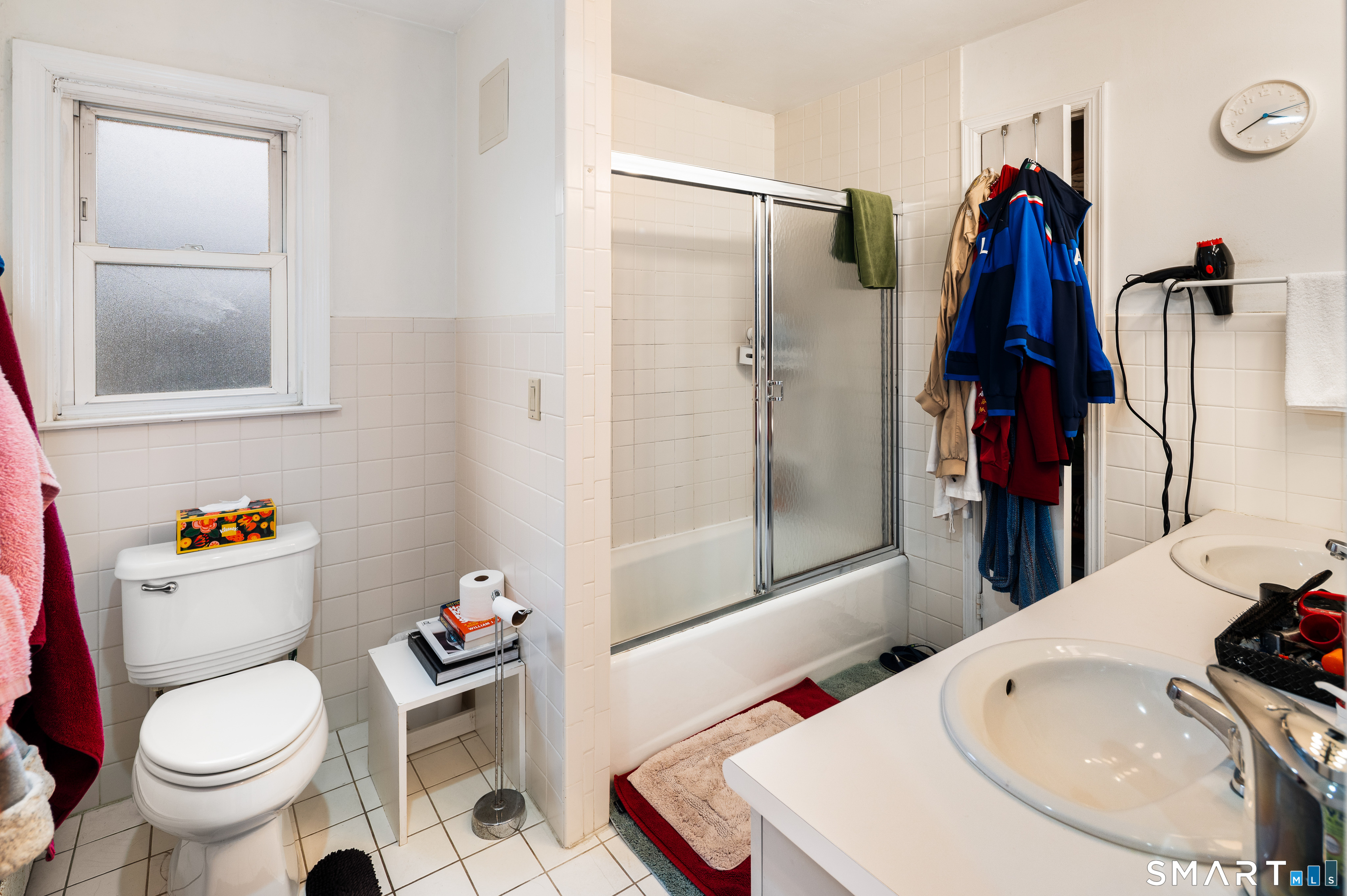 760 Hope Street Stamford, CT 06907 - Photo 28 of 38 a bathroom with a sink toilet and shower