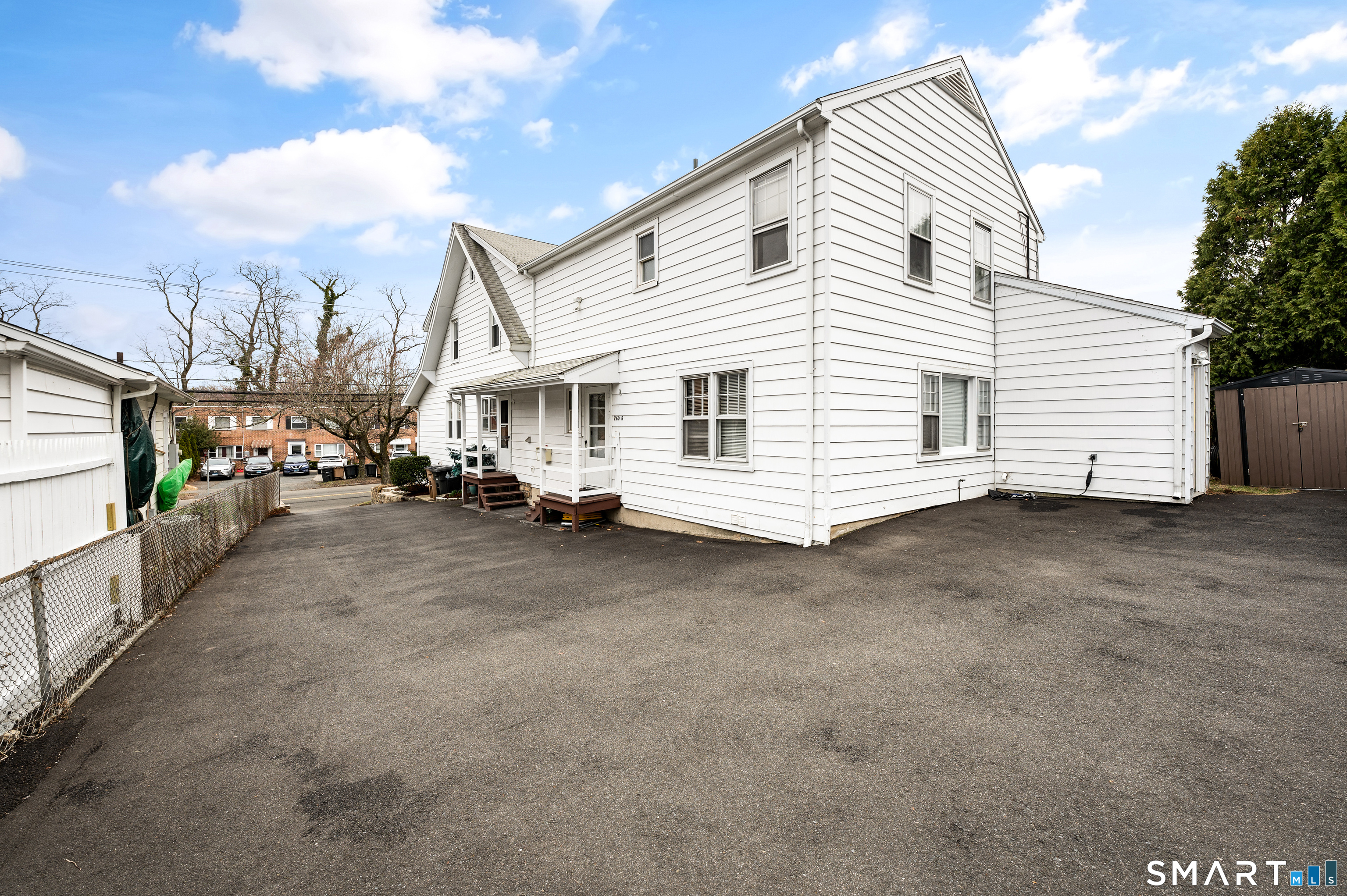 760 Hope Street Stamford, CT 06907 - Photo 4 of 38 a view of a house with a street