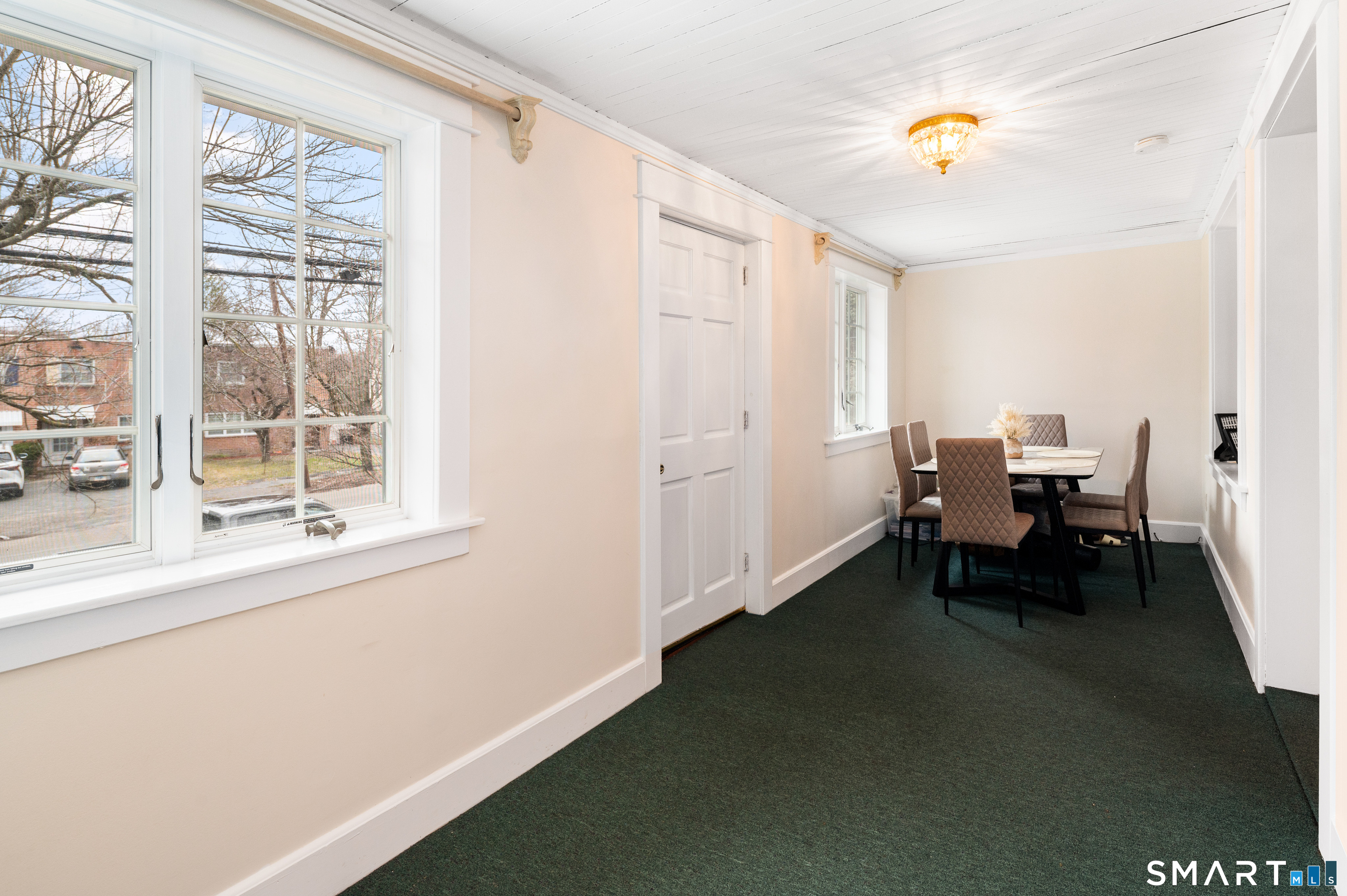 760 Hope Street Stamford, CT 06907 - Photo 6 of 38 a view of a workspace with furniture and a window