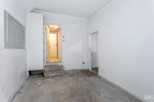 a view of a back yard of a house