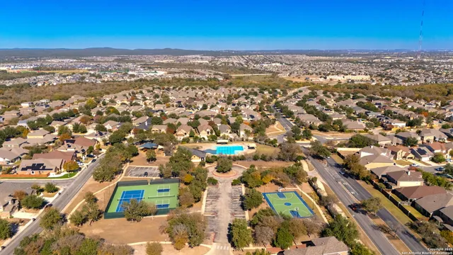 an aerial view of residential building with parking space
