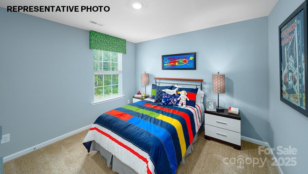 834 North Naughton Street Chester, SC 29706 - Photo 18 of 28 a bedroom with a bed and a window