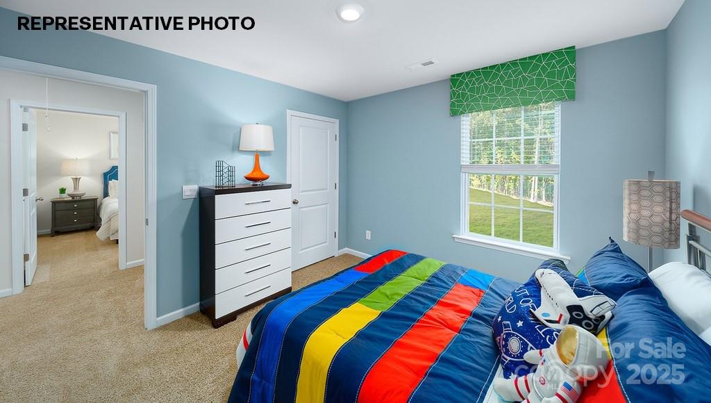 834 North Naughton Street Chester, SC 29706 - Photo 19 of 28 a bedroom with a bed and a dresser