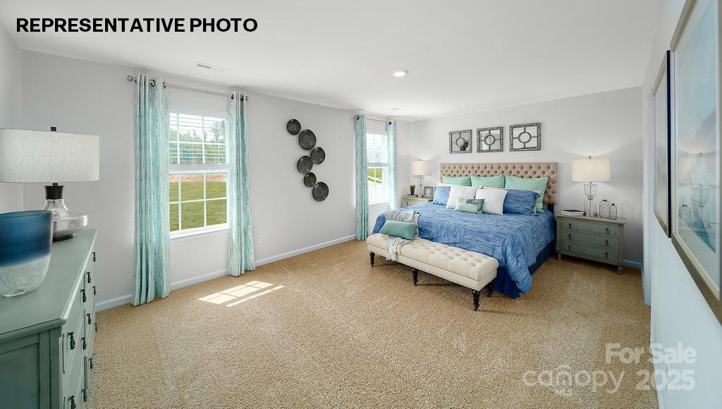 834 North Naughton Street Chester, SC 29706 - Photo 23 of 28 a bedroom with a bed and a window