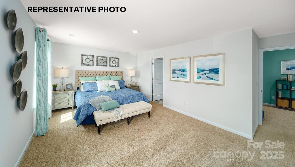 834 North Naughton Street Chester, SC 29706 - Photo 24 of 28 a bedroom with furniture and a flat screen tv
