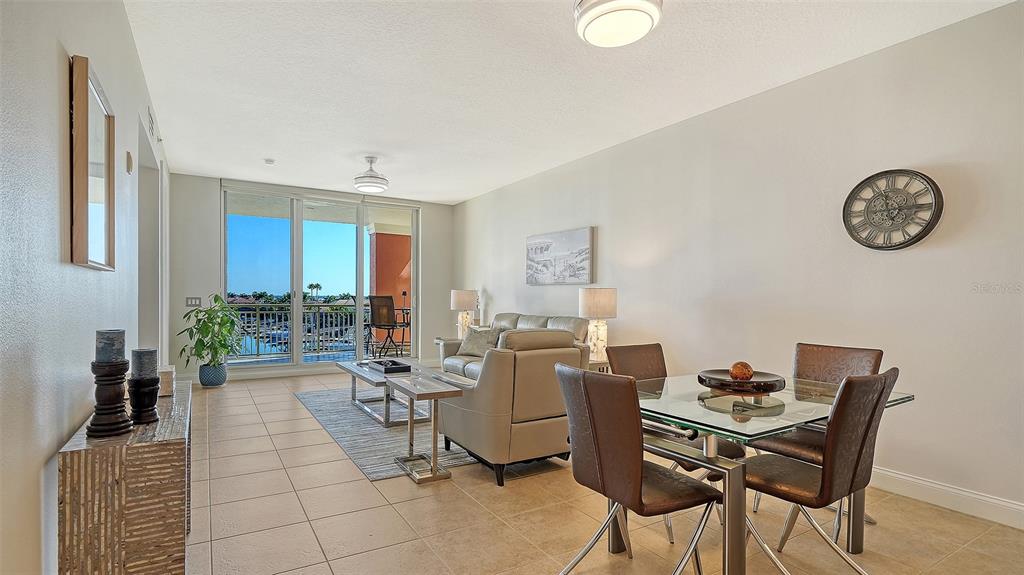 610 Riviera Dunes Way, Unit 306 Palmetto, FL 34221 - Photo 17 of 58 a view of a workspace with furniture and a window