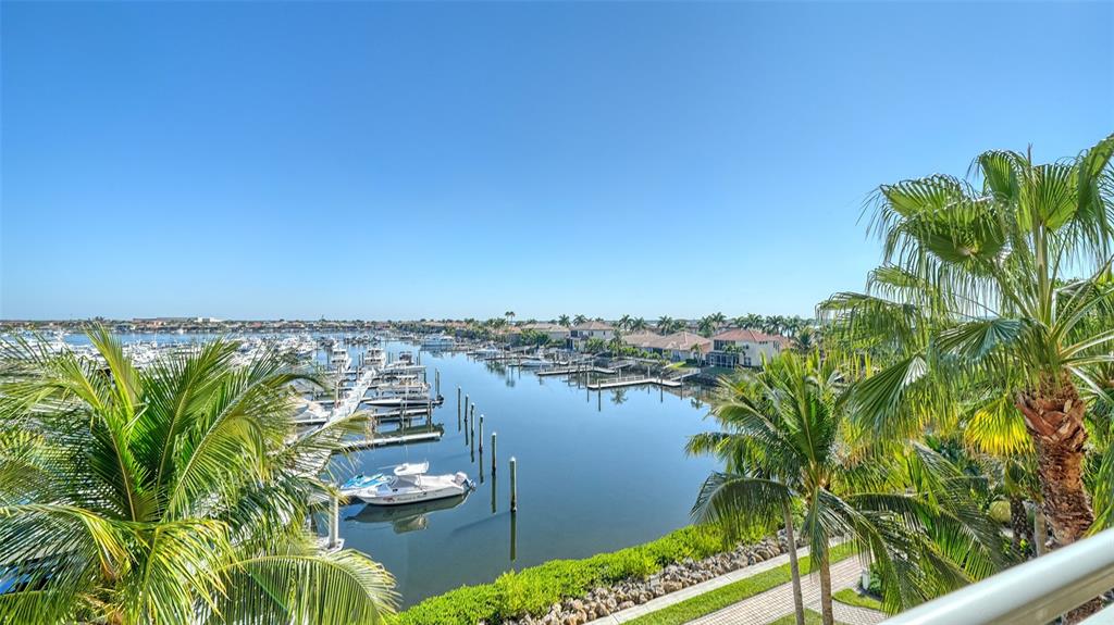 610 Riviera Dunes Way, Unit 306 Palmetto, FL 34221 - Photo 26 of 58 a view of a flower in a garden