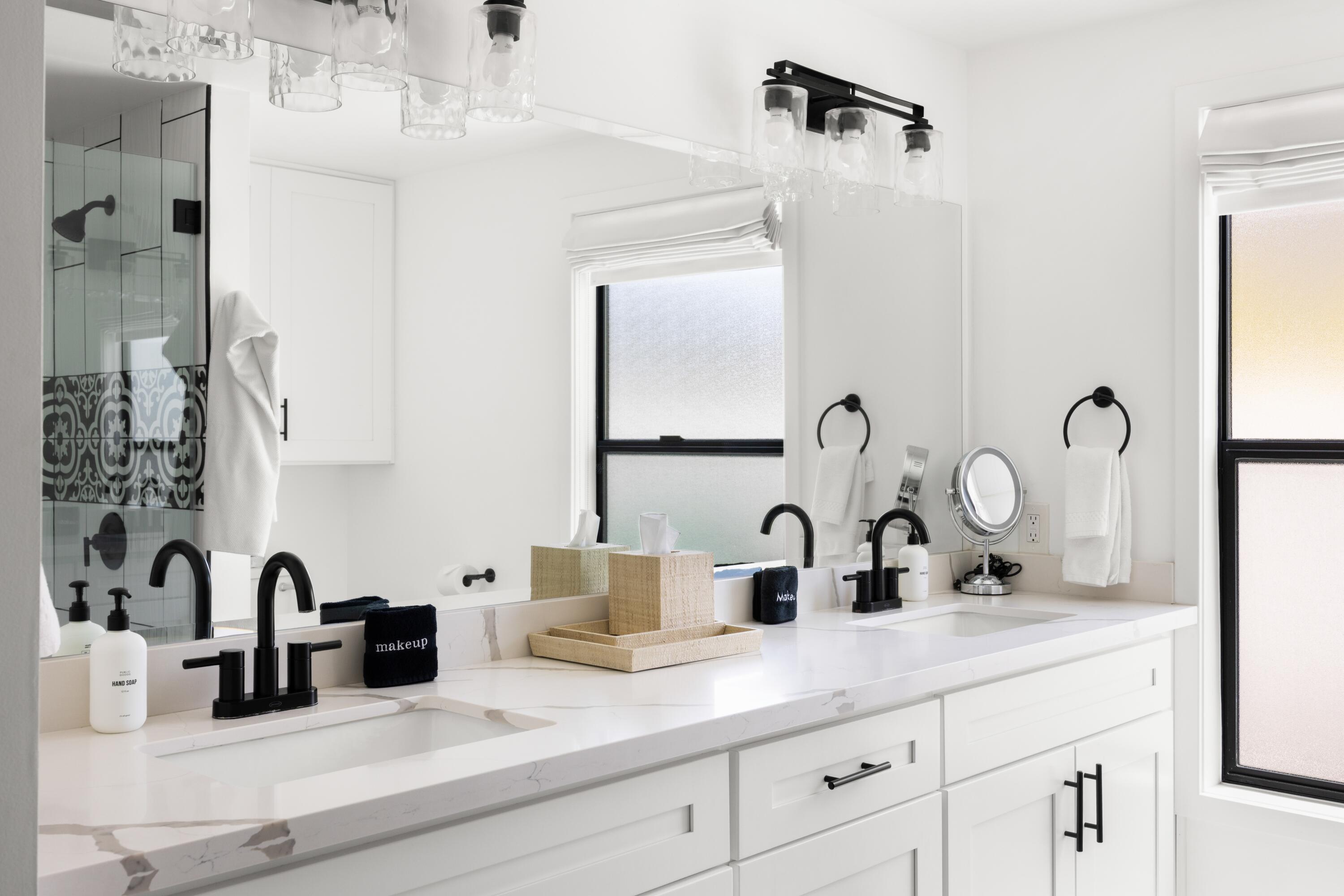72870 Bel Air Road, Unit 4 Palm Desert, CA 92260 - Photo 17 of 36 a bathroom with sink and mirror