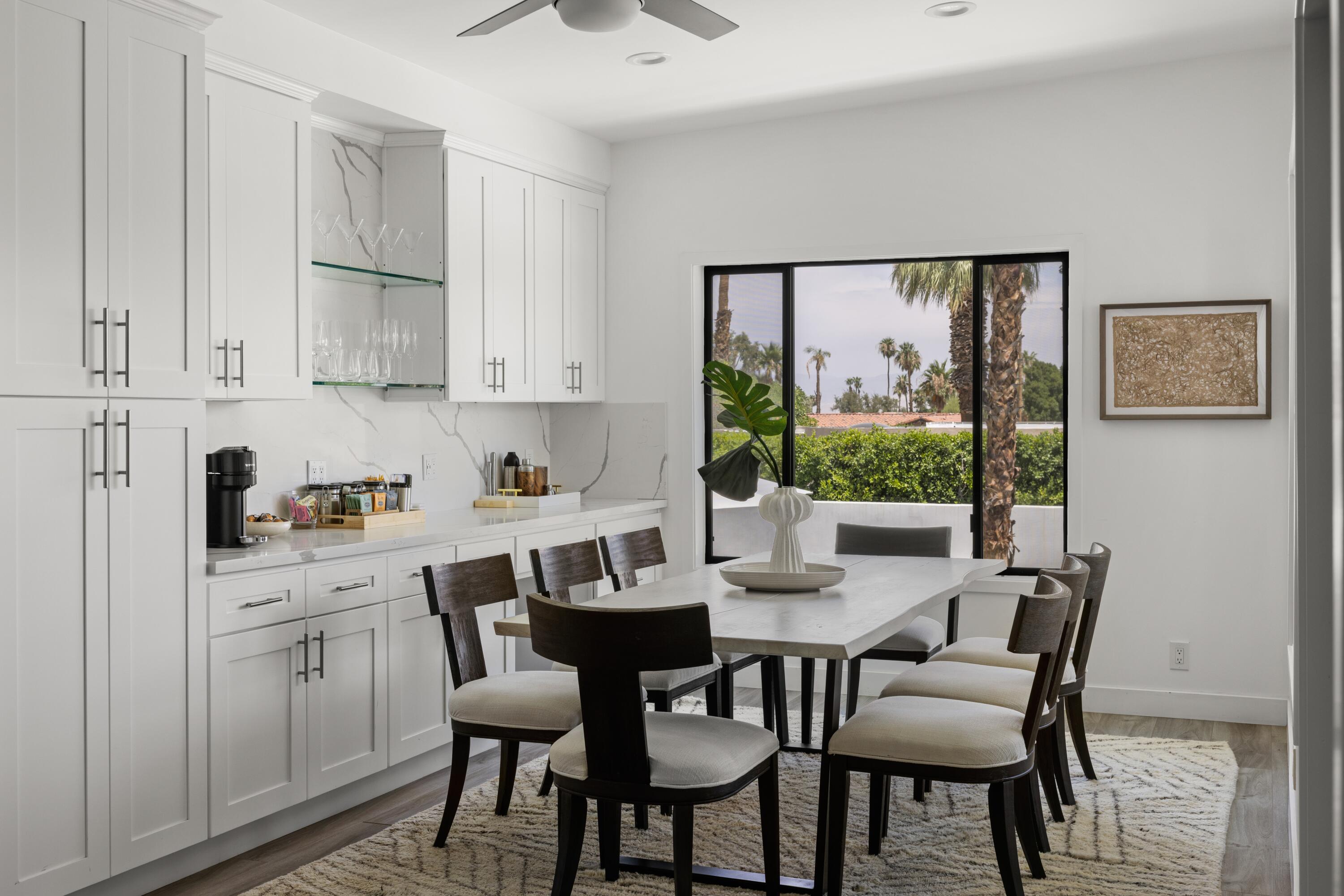 72870 Bel Air Road, Unit 4 Palm Desert, CA 92260 - Photo 7 of 36 a view of a dining room with furniture window and outside view
