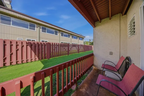 a view of a porch with furniture