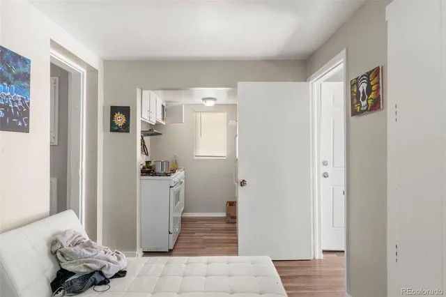 a kitchen with a stove and cabinets