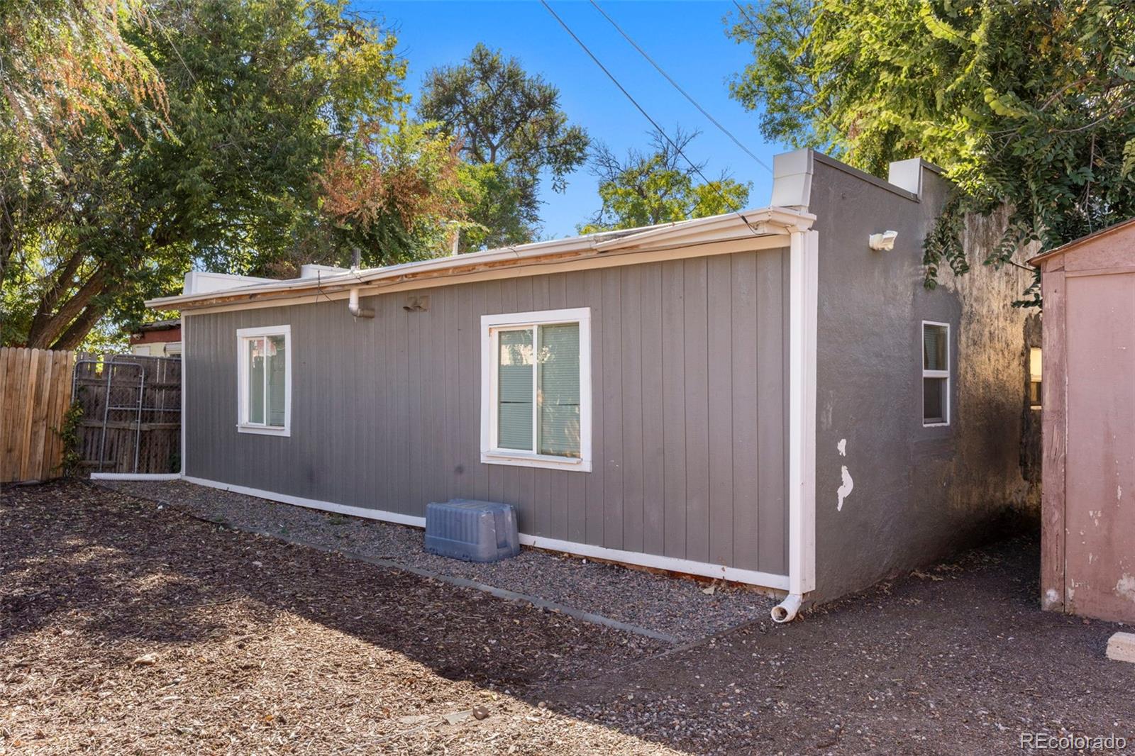 1558 Dallas Street Aurora, CO 80010 - Photo 19 of 24 a backyard of a house