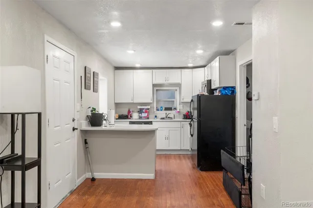 a bedroom with bed and a window