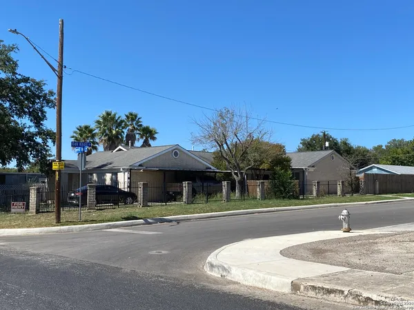 a swimming pool with outdoor seating