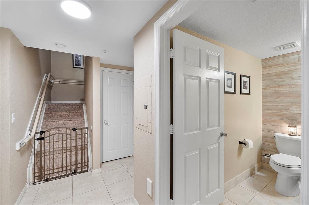 6926 West Sample Road, Unit 6926 Coral Springs, FL 33067 - Photo 14 of 41 a bathroom with a shower and toilet