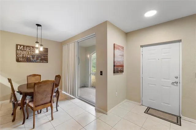 a view of a livingroom with furniture and windows