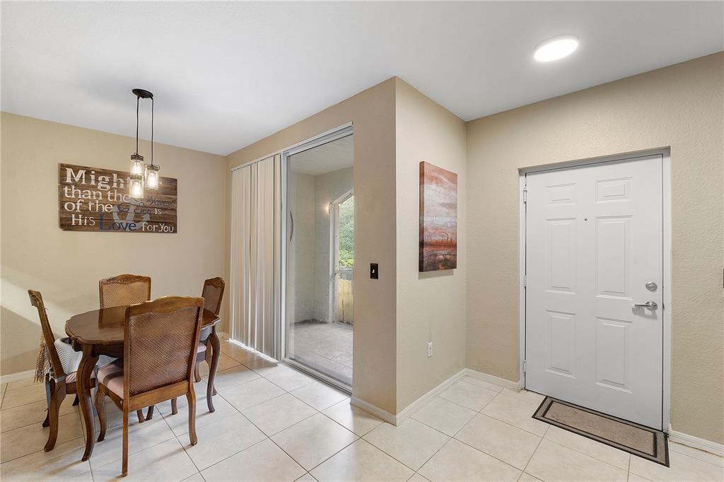 6926 West Sample Road, Unit 6926 Coral Springs, FL 33067 - Photo 6 of 41 a view of a livingroom with furniture and windows