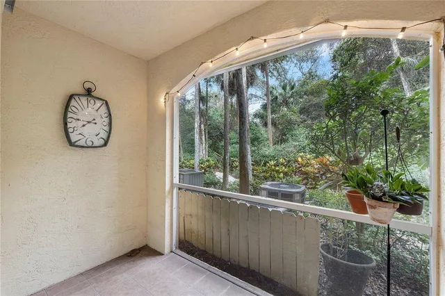 a view of a room with a large window