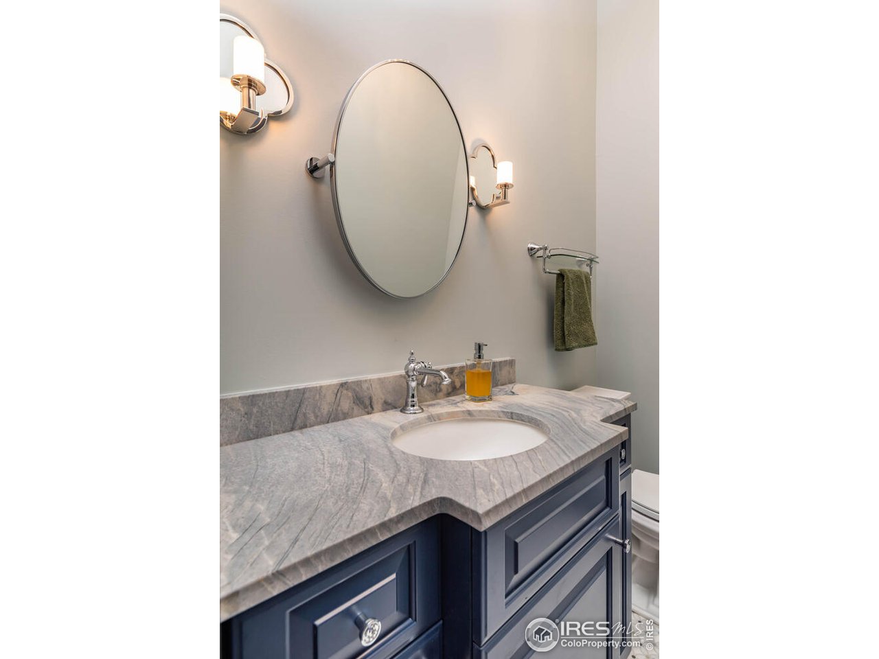 1507 Pine Street Boulder, CO 80302 - Photo 12 of 28 a bathroom with a granite countertop sink and a mirror