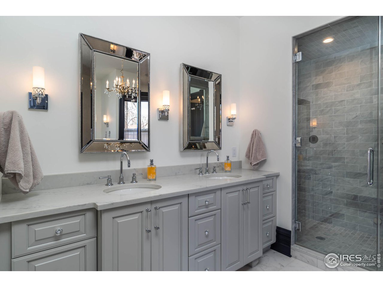 1507 Pine Street Boulder, CO 80302 - Photo 18 of 28 a bathroom with a double vanity sink and a mirror
