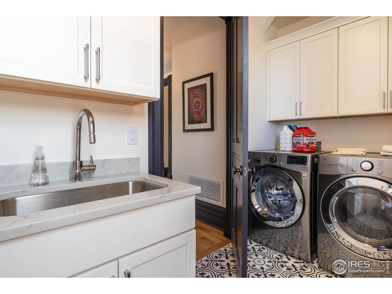 1507 Pine Street Boulder, CO 80302 - Photo 21 of 28 a utility room with sink dryer and washer