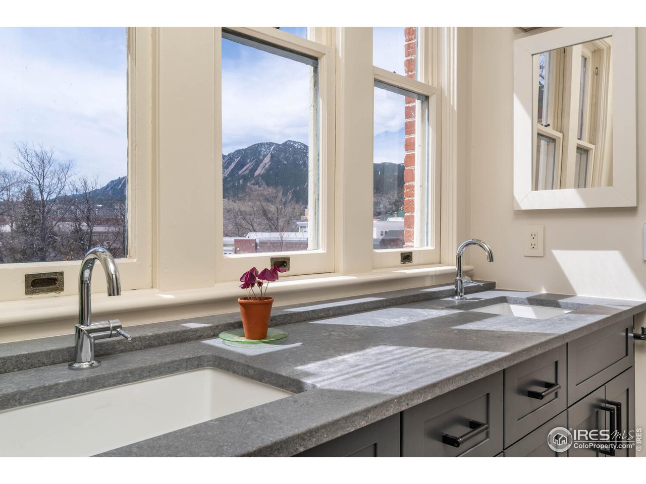 1507 Pine Street Boulder, CO 80302 - Photo 25 of 28 a kitchen with a sink and a window