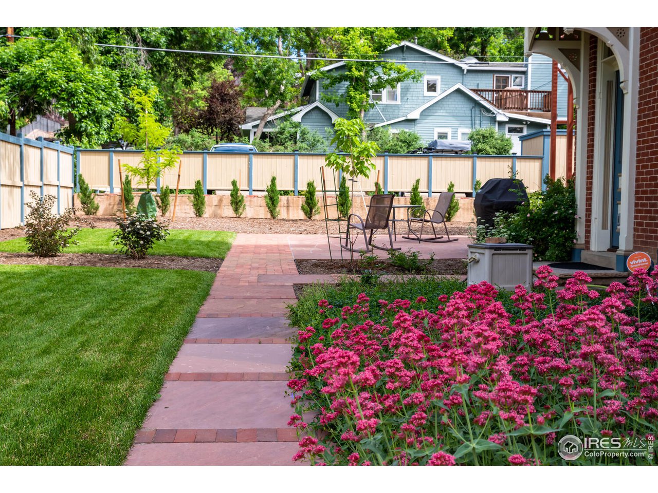 1507 Pine Street Boulder, CO 80302 - Photo 27 of 28 a view of a backyard with potted plants