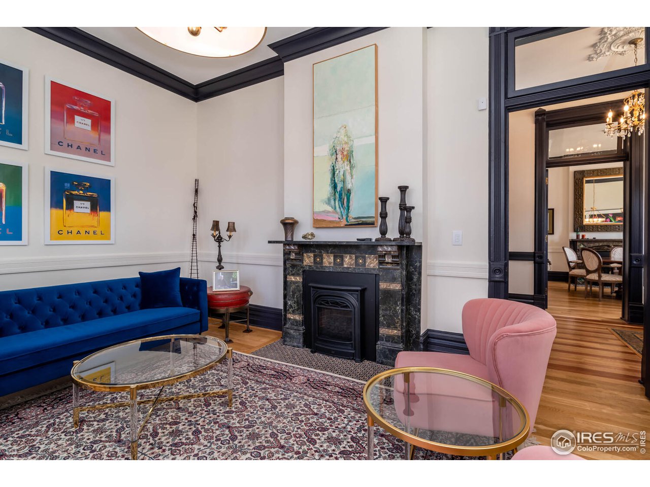 1507 Pine Street Boulder, CO 80302 - Photo 6 of 28 a living room with furniture a fireplace and a potted plant