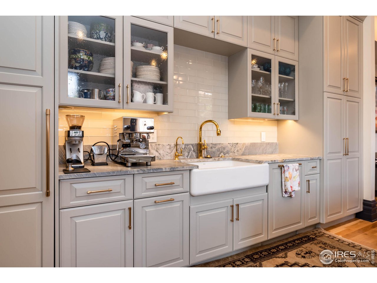 1507 Pine Street Boulder, CO 80302 - Photo 9 of 28 a kitchen with cabinets appliances and a sink