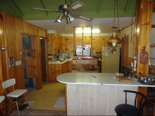 8884 Highway 251 Rochelle, IL 61068 - Photo 3 of 8 a room with table and chairs
