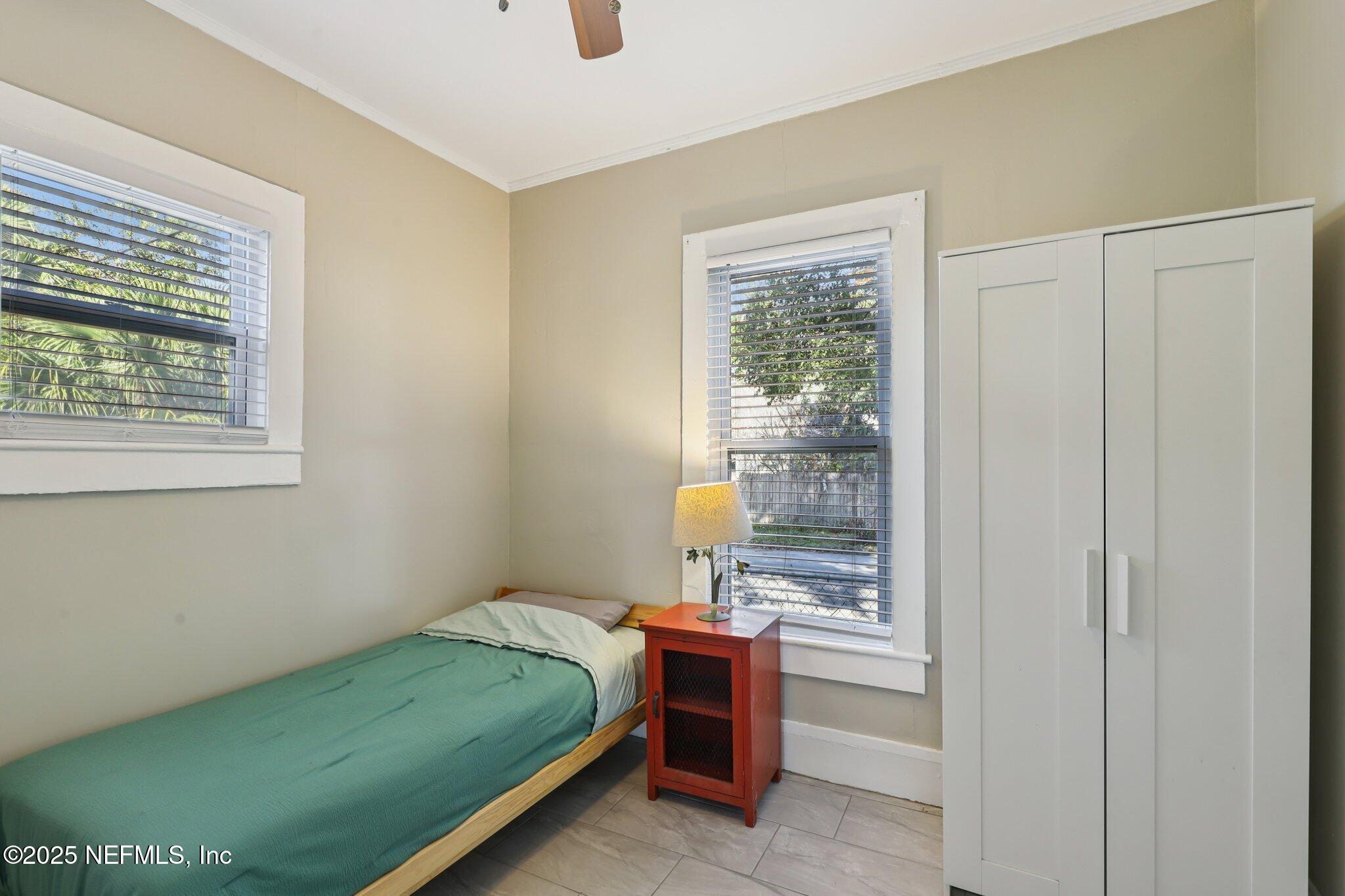 646 Day Avenue Jacksonville, FL 32205 - Photo 16 of 27 a bedroom with a bed and a window