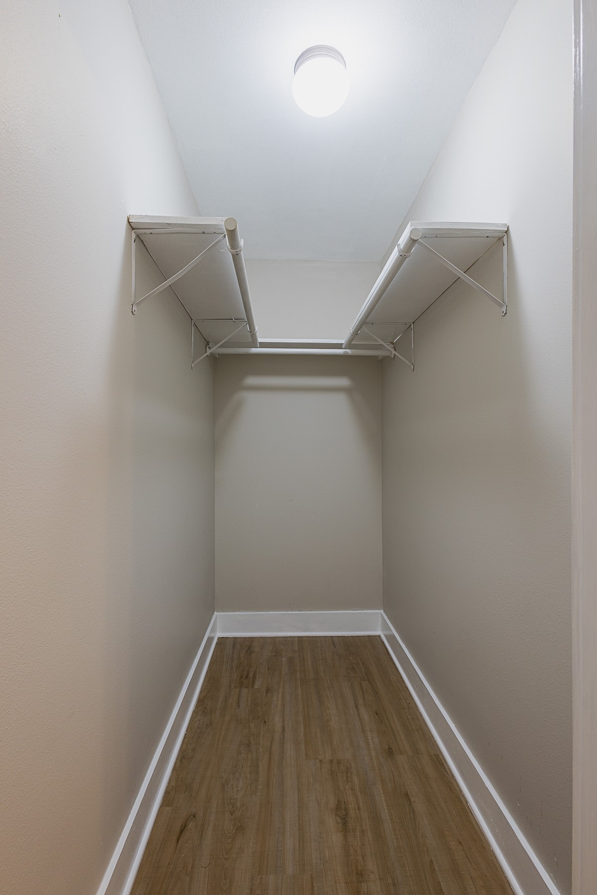 12028 Cedar Lane Conroe, TX 77303 - Photo 13 of 41 a view of a room with racks on the wall