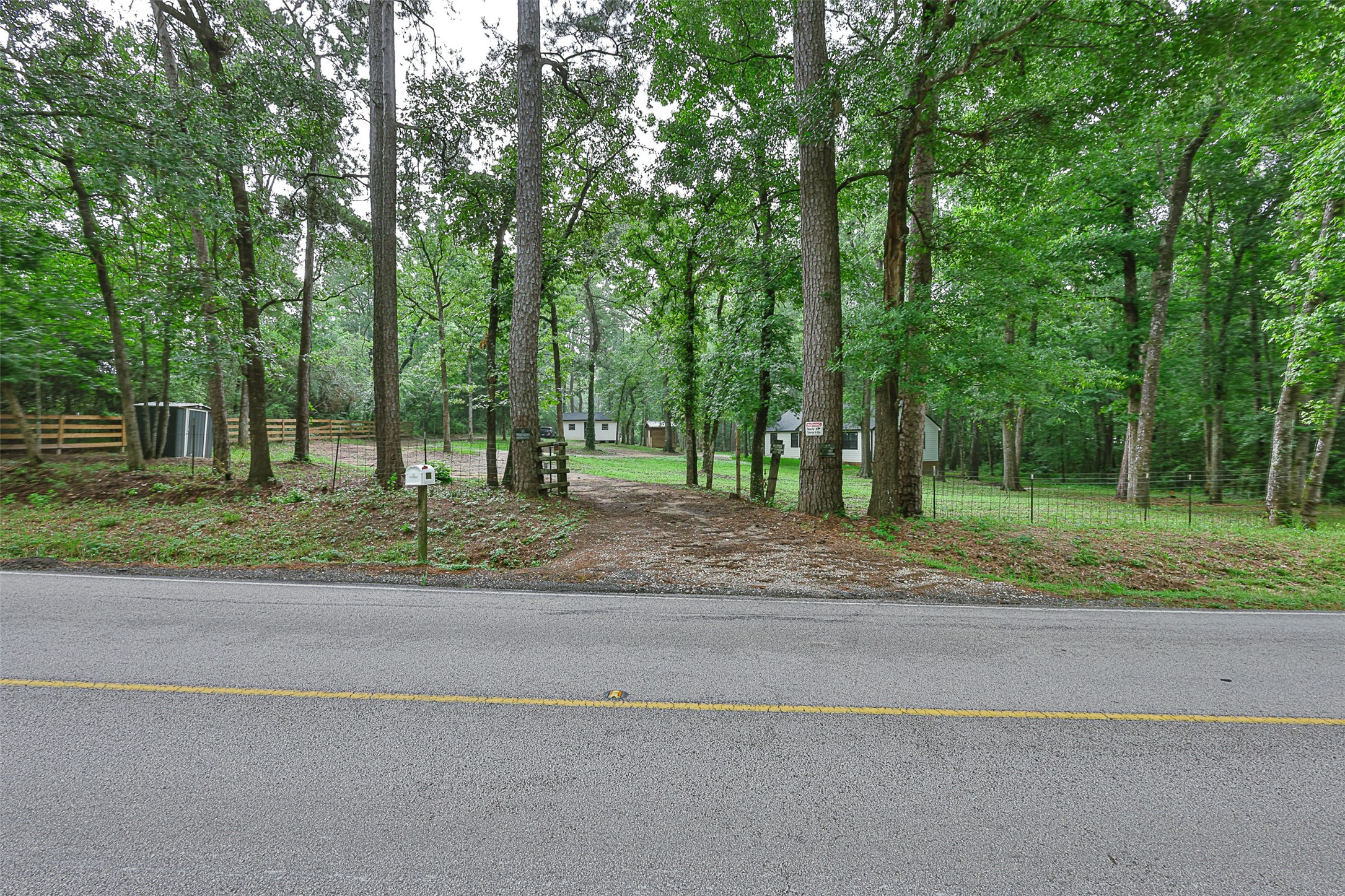 12028 Cedar Lane Conroe, TX 77303 - Photo 26 of 41 a view of a yard with green space