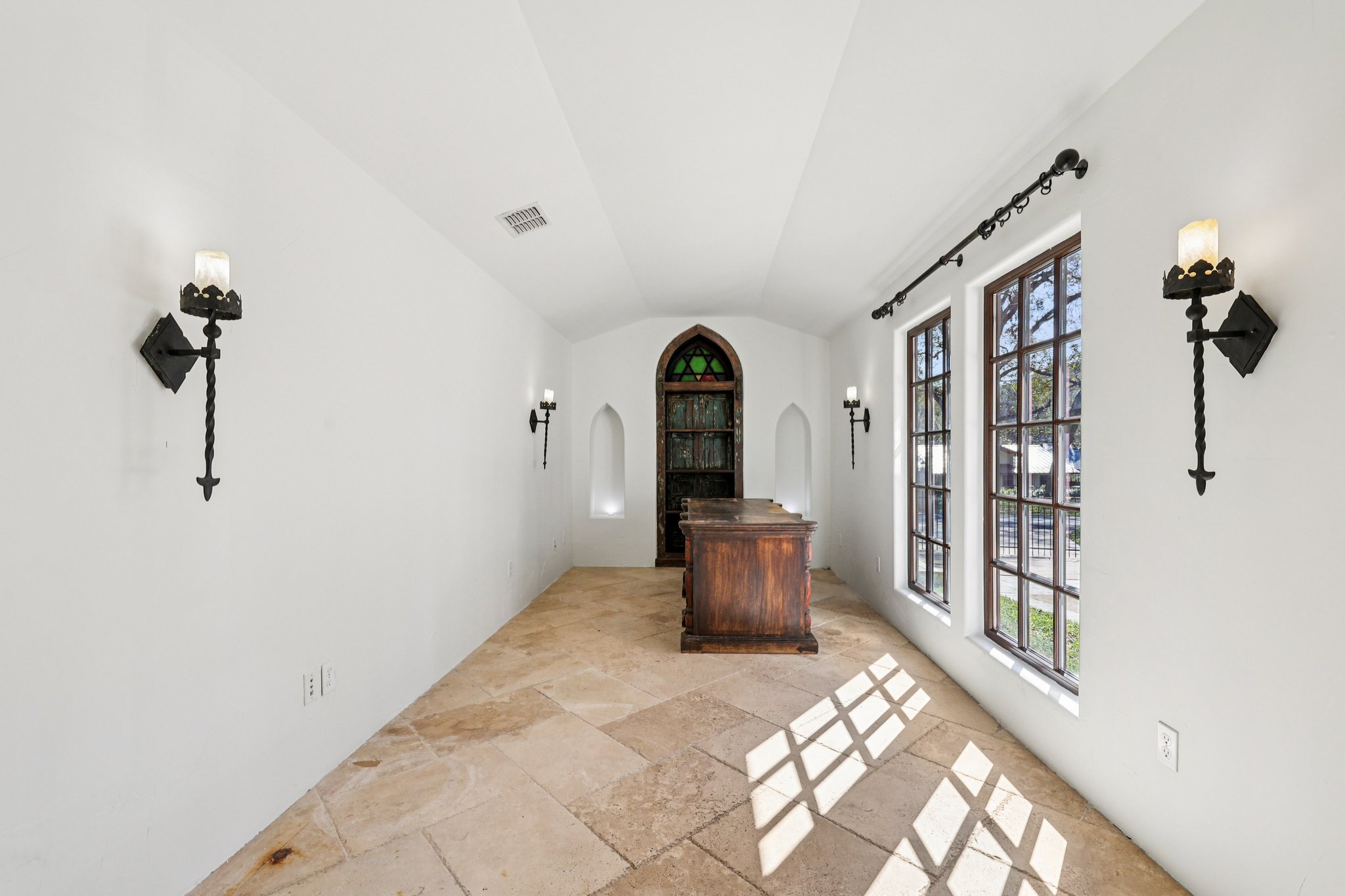 2706 Pearce Road Austin, TX 78730 - Photo 30 of 38 a view of a hallway with windows