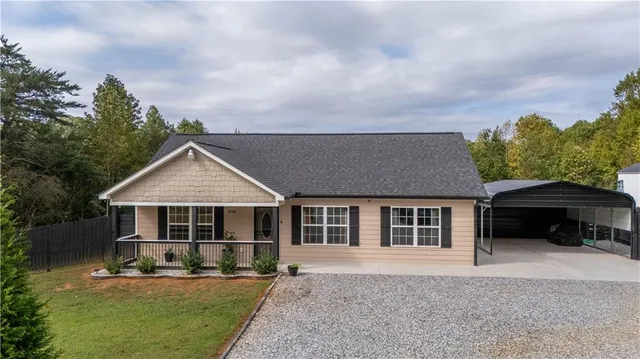 front view of a house with a yard